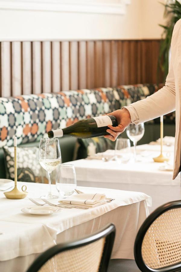 On Residence - Small Luxury Hotels Of The World Thessaloniki Exterior photo A sommelier serving wine